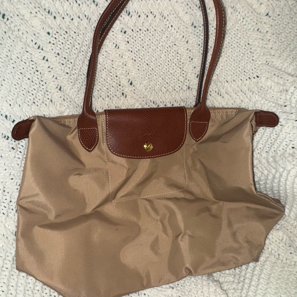 Longchamp Tan and Brown Nylon Tote Bag

*Please note purple stain inside bag